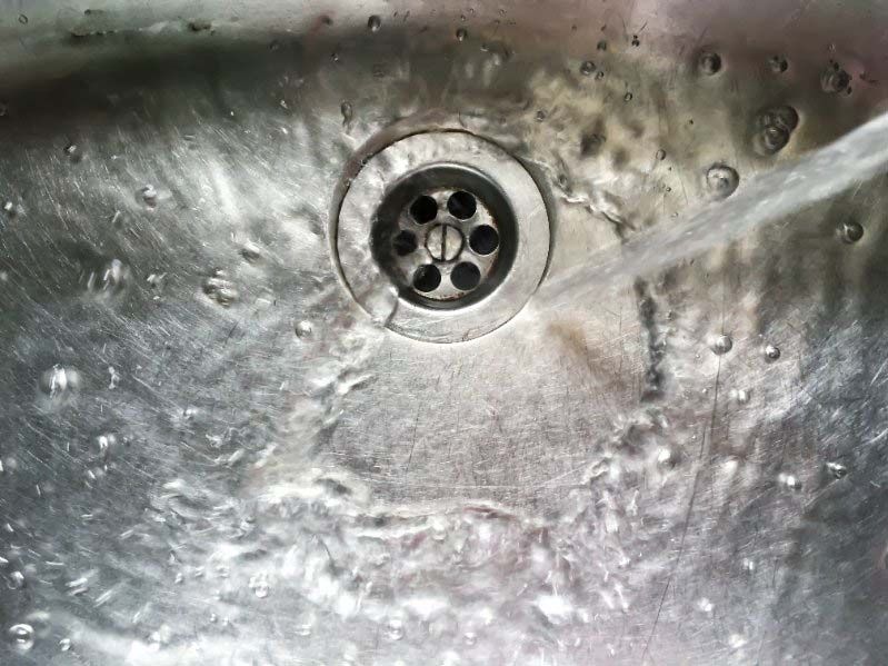 Water flowing down the drain