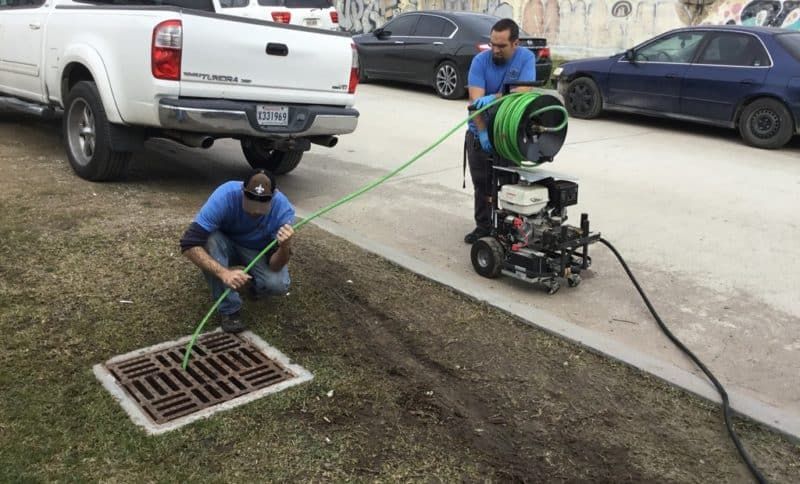 technicians work on Sewer-and-Drain-Cleaning