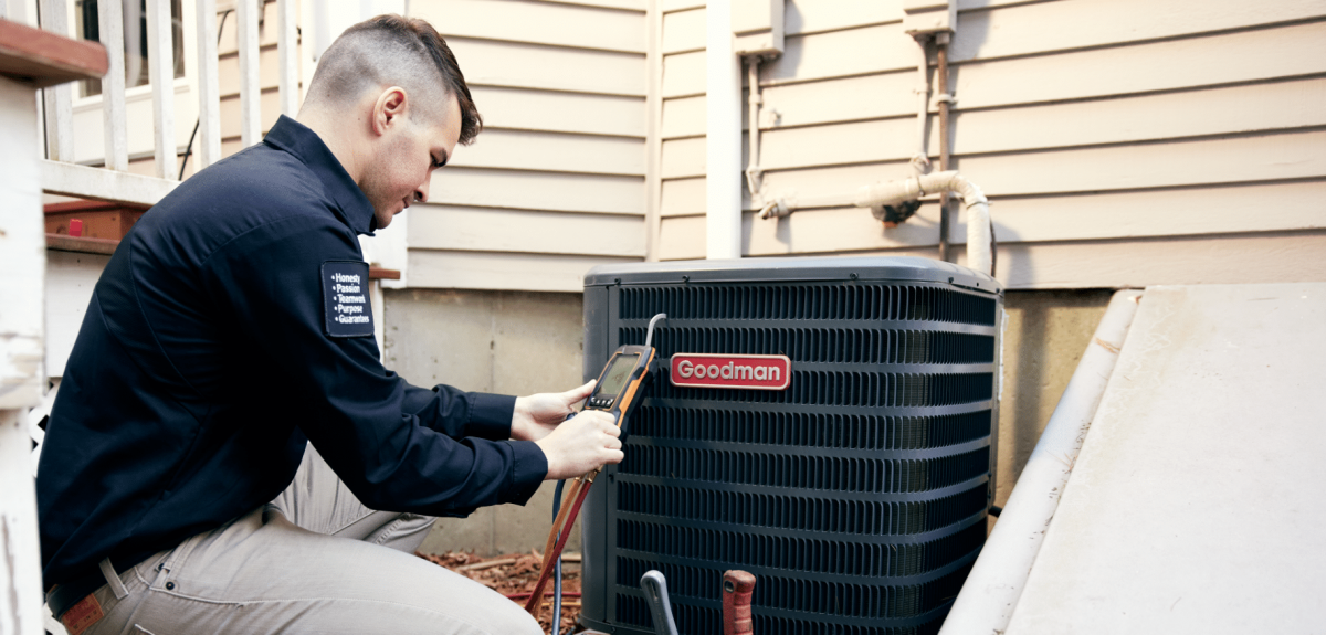 Technician doing AC service